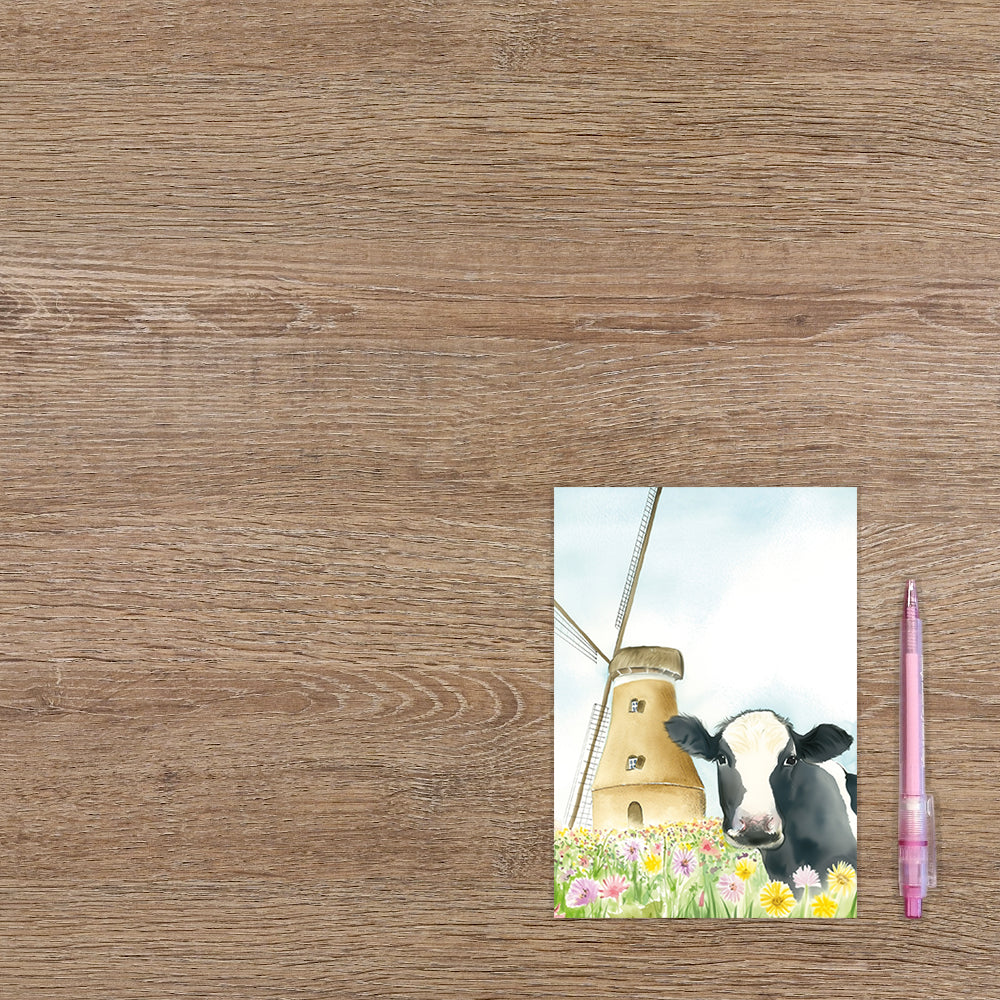 Koe met molen