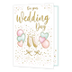 On your wedding day - Formaat: Groot - Vorm: Staand - Huwelijkskaart - Op deze wenskaart staat in het goud de tekst 'On your wedding day'. Onder de tekst staan twee champagne glazen met daaraan hartjes vormige ballonnen. De kaart is versierd met gouden, blauwe en roze hartjes. - Snelwenskaart