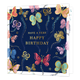 Have a very happy birthday - Formaat: Standaard - Vorm: Vierkant - Verjaardagskaart - Op deze kaart staat de tekst 'Have a very happy birthday' in het goud met daaromheen vlinders in de kleuren blauw, rood, roze, groen en goud. Achter de vlinders is een spoor van gouden stippen. - Snelwenskaart