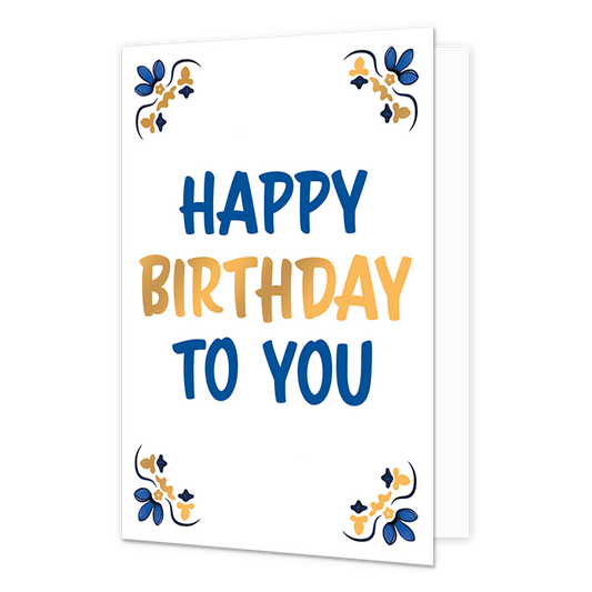 Happy birthday to you - Formaat: Normaal - Vorm: Staand - Verjaardagskaart - Op deze wenskaart staat centraal de tekst "Happy Birthday to You" in grote, speelse letters geschreven tegen een effen witte achtergrond. Hierbij zijn de woorden "Happy" en "to You" in het blauw gedrukt en is het middelste woord "Birthday" in het goud uitgevoerd. In de vier hoeken van de kaart bevindt zich een symmetrisch, traditioneel ornament in blauwe en goudkleurige tinten, geïnspireerd op een klassiek tegelontwerp. - Snelwens