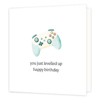 You just levelled up happy birthday - Formaat: Normaal - Vorm: Vierkant - Verjaardagskaart - Op deze wenskaart staat een gamecontroler met daaronder de tekst: "You just levelled up happy birthday". - Snelwenskaart