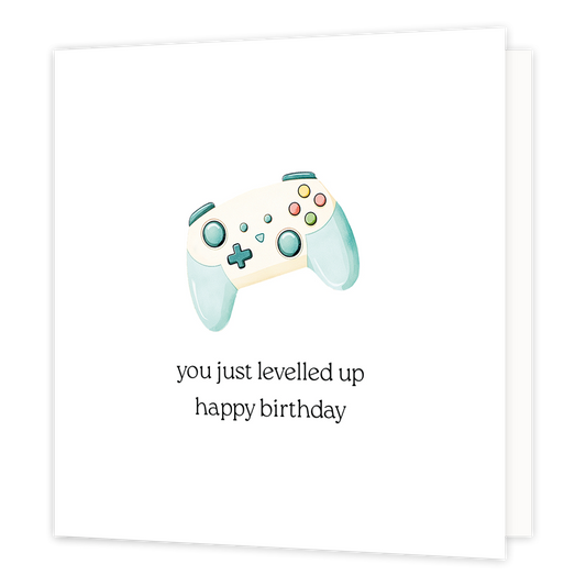 You just levelled up happy birthday - Formaat: Normaal - Vorm: Vierkant - Verjaardagskaart - Op deze wenskaart staat een gamecontroler met daaronder de tekst: "You just levelled up happy birthday". - Snelwenskaart