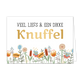 Veel liefs & een dikke knuffel - Formaat: Standaard - Vorm: Liggend - Vriendschapskaart - Op deze wenskaart staat een bloemenveld met bloemen in de kleuren blauw, oranje, beige en goud. Bovenaan staat de tekst: "Veel liefs & een dikke knuffel". - Snelwenskaart