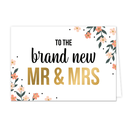 To the brand new mr & mrs - Formaat: Normaal - Vorm: Liggend - Huwelijkskaart - Op deze wenskaart staan bloemen in de kleuren roze en beige met in het midden de tekst: "To the brand new MR & MRS". - Snelwenskaart