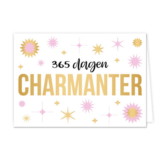 365 dagen chamanter - Formaat: Normaal - Vorm: Liggend - Verjaardagskaart - Op deze wenskaart staan allemaal goud en roze sterren. In het midden staat groot in gouden tekst 'Chamanter'. En daarboven staat in zwart '365 dagen'. - Snelwenskaart