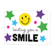 Sending you a smile - Formaat: Standaard - Vorm: Liggend - Denken aan kaart - Op deze wenskaart staat een witte achtergrond die versierd is met verschillende gekleurde sterren in het groen, paars, blauw en roze. Bovenaan in het midden bevindt zich een grote gele smiley met zwarte ogen en een brede glimlach. Daaronder staat in zwarte, sierlijke letters de tekst "Sending you a", gevolgd door het woord "SMILE" in grote, dikke zwarte hoofdletters. - Snelwenskaart
