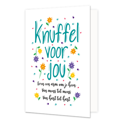 Knuffel voor jou - Formaat: Standaard - Vorm: Staand - Vriendschapskaart - Op deze wenskaart staan bloemen en stippen in de kleuren blauw, paars, rood, groen, oranje en geel. In het midden staat de tekst: "Knuffel voor jou, even een arm om je heen van mens tot mens van hart tot hart". - Snelwenskaart