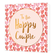 To the happy couple - Formaat: Standaard - Vorm: Vierkant - Huwelijkskaart - Op deze wenskaart staan hartjes met in het midden een beige cirkel met gouden omlijning en de tekst: "To the happy couple". - Snelwenskaart