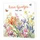 Lieve groetjes van ons - Formaat: Standaard - Vorm: Vierkant - Denken aan kaart - Op deze wenskaart staat een bloemenveld met de kleuren oranje, geel, paars, roze en groen. Daarboven staat de tekst: "Lieve groetjes van ons". - Snelwenskaart