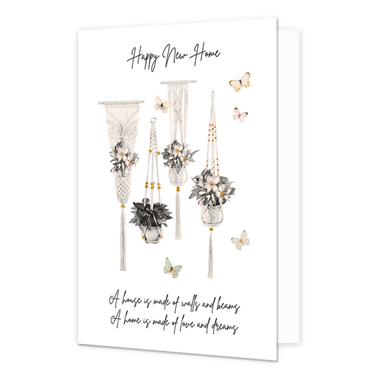 Happy new home - Formaat: Normaal - Vorm: Staand - Woningkaart - Op deze wenskaart staan bloemen en vlinders in de kkleuren geel, roze, wit, beige, groen en grijs. In de illustratie staan de teksten: "Happy New Home" en "A house is made of walls and beams. A home is made of love and dreams". - Snelwenskaart