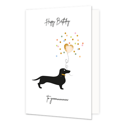 Happy birthday - Formaat: Normaal - Vorm: Staand - Verjaardagskaart - Op deze wenskaart staat een illustratie van een zwarte teckel met een gouden halsband tegen een witte achtergrond. Boven de snuit van de hond zweeft een hartvormige ballon, die omringd wordt door een wolk van kleurrijke en gouden confetti. Bovenaan de kaart staat de tekst "Happy Birthday" en onder de hond staat "To yooooouuuuuu", beide geschreven in een zwart, handgeschreven lettertype. - Snelwenskaart