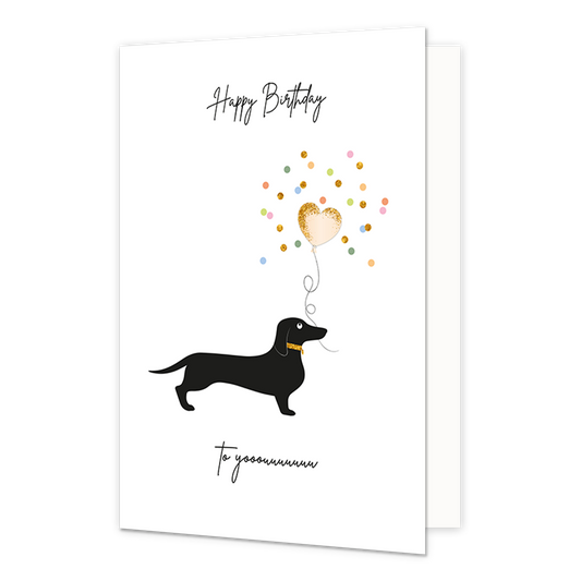 Happy birthday - Formaat: Normaal - Vorm: Staand - Verjaardagskaart - Op deze wenskaart staat een illustratie van een zwarte teckel met een gouden halsband tegen een witte achtergrond. Boven de snuit van de hond zweeft een hartvormige ballon, die omringd wordt door een wolk van kleurrijke en gouden confetti. Bovenaan de kaart staat de tekst "Happy Birthday" en onder de hond staat "To yooooouuuuuu", beide geschreven in een zwart, handgeschreven lettertype. - Snelwenskaart