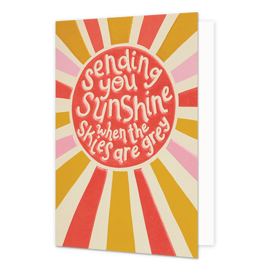 Sending you sunshine when the skies are grey - Formaat: Normaal - Vorm: Staand - Denken aan kaart - Op deze wenskaart staan lijnen in de kleuren roze, wit, groen en oranje met in het midden een rode cirkel met de tekst: "Sending you sunshine when the skies are grey". - Snelwenskaart
