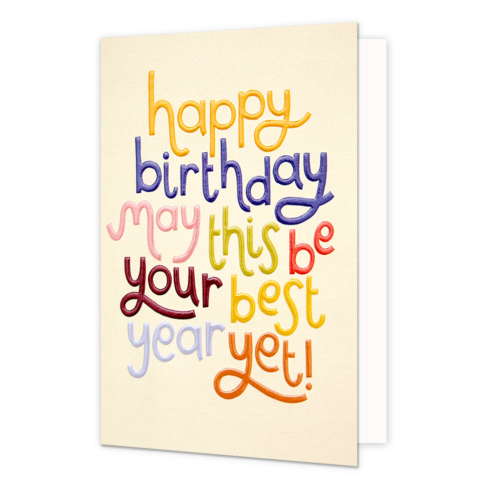 Happy birthday - Formaat: Normaal - Vorm: Staand - Verjaardagskaart - Op deze wenskaart staat de tekst "happy birthday may this be your best year yet!" centraal tegen een lichtbeige achtergrond. De woorden zijn uitgevoerd in een speels, handgeschreven lettertype waarbij elke regel of elk woord een andere kleur heeft, zoals geel, blauw, roze, groen, rood, paars en oranje. De letters lijken een licht reliëf of een geborduurd effect te hebben, wat de kaart een tactiele uitstraling geeft. - Snelwenskaart