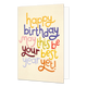 Happy birthday - Formaat: Standaard - Vorm: Staand - Verjaardagskaart - Op deze wenskaart staat de tekst "happy birthday may this be your best year yet!" centraal tegen een lichtbeige achtergrond. De woorden zijn uitgevoerd in een speels, handgeschreven lettertype waarbij elke regel of elk woord een andere kleur heeft, zoals geel, blauw, roze, groen, rood, paars en oranje. De letters lijken een licht reliëf of een geborduurd effect te hebben, wat de kaart een tactiele uitstraling geeft. - Snelwenskaart