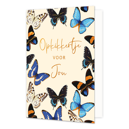 Opkikkertje voor jou - Formaat: Normaal - Vorm: Staand - Opkikker kaart - Op deze wenskaart staan vlinders in de kleuren goud, blauw, wit en zwart. In het midden staat de tekst "Opkikkertje voor jou" in het goud. - Snelwenskaart