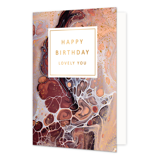 Happy Birthday lovely you - Formaat: Normaal - Vorm: Staand - Verjaardagskaart - Op deze wenskaart is een ontwerp te zien geïnspireerd op de vlekken van een luipaard, met de kleuren zwart, bruin en goud. In het midden zit een wit blok met de gouden tekst: "Happy birthday lovely you". - Snelwenskaart
