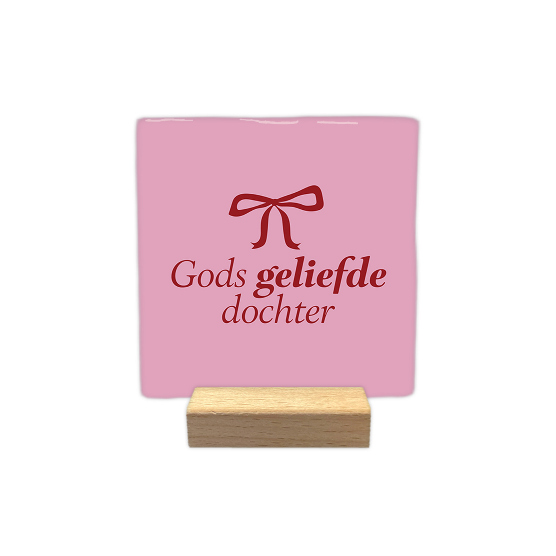 Gods geliefde dochter - Decoratie tegel - Formaat: - Op deze decoratie tegel staat bovenaan een rode strik afgebeeld. Daaronder staat de tekst "Gods geliefde dochter" in rode letters. Het geheel is geplaatst tegen een lichtroze achtergrond. - Snelwenskaart