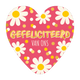 Gefeliciteerd van ons - Formaat: Groot - Vorm: Hart - Felicitatiekaart - Op deze harten wenskaart is een roze achtergrond te zien met een decoratief patroon van witte bloemen met gele harten en verspreide gele en witte stippen. Centraal staat de tekst "GEFELICITEERD" in een groot, goudkleurig lettertype, met daaronder in een kleiner, wit lettertype "VAN ONS". Het ontwerp heeft een feestelijke en vrolijke uitstraling door de combinatie van de bloemenelementen en de opvallende belettering. - Snelwenskaart