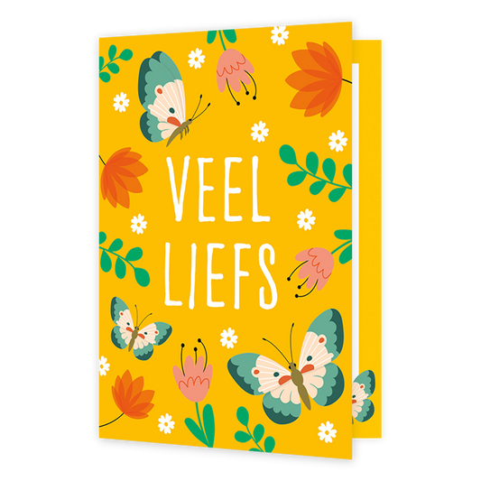 Veel liefs - Formaat: Klein - Vorm: Staand - Liefdeskaart - Op deze wenskaart staat de tekst "VEEL LIEFS" centraal in grote, witte letters afgebeeld tegen een felgele achtergrond. De illustratie is rondom de tekst versierd met kleurrijke vlinders, bloemen en bladeren in een gestileerde, vrolijke stijl. De vlinders hebben groenblauwe vleugels met roze accenten en de bloemen variëren in roze en oranje tinten. Het geheel oogt als een levendige en zonnige tekening. - Snelwenskaart