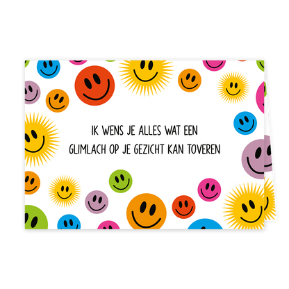 Glimlach op je gezicht - Formaat: Klein - Vorm: Liggend - Denken aan kaart - Op deze wenskaart staan smiley in diverse kleuren met in het midden de tekst: "Ik wens je alles wat een glimlach op je gezicht kan toveren". - Snelwenskaart