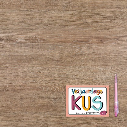 Verjaardagskus door de brievenbus