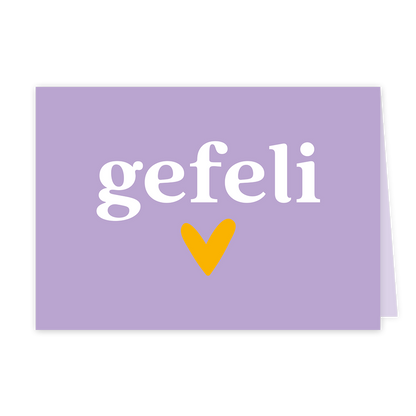 Op deze wenskaart staat een hart met daarboven de tekst: "Gefeli".