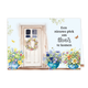 Een nieuwe plek om thuis te komen - Formaat: Standaard - Vorm: Liggend - Woningkaart - Op deze wenskaart staat een deur met bloemen en rechts op de kaart staat de tekst: "Een nieuwe plek om thuis te komen". - Snelwenskaart