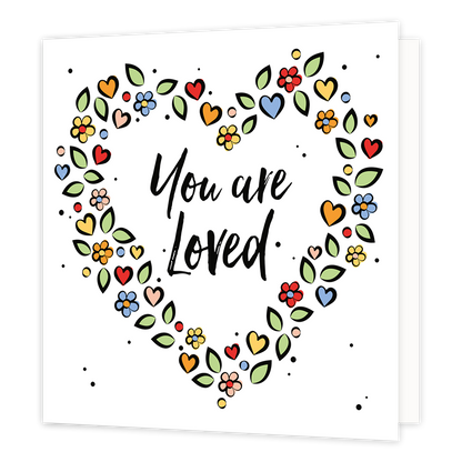 You are loved - Formaat: Normaal - Vorm: Vierkant - Liefdeskaart - Op deze wenskaart staat een hartje gemaakt van bloemen en kleine hartjes met in het midden de tekst: "You are loved". - Snelwenskaart