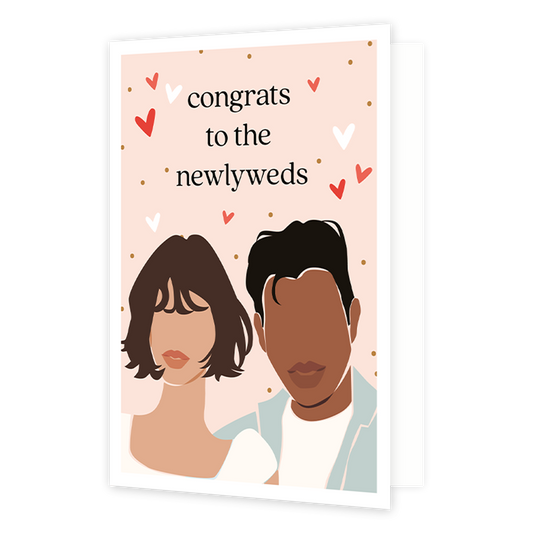 Congrats to the newlyweds - Formaat: Normaal - Vorm: Staand - Huwelijkskaart - Op deze wenskaart staat een bruispaar op een roze achtergrond met hartjes erom heen. Boven de illustratie staat de tekst: "Congrats to the newlyweds". - Snelwenskaart