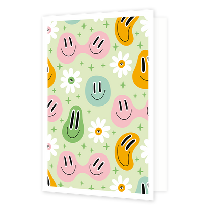 Smileys - Formaat: Normaal - Vorm: Staand - Blanco kaart - Op deze wenskaart staan smileys in de kleuren groen, blauw, roze en oranje met bloemen erom heen. - Snelwenskaart
