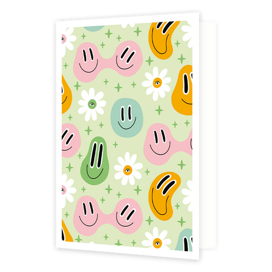 Smileys - Formaat: Normaal - Vorm: Staand - Blanco kaart - Op deze wenskaart staan smileys in de kleuren groen, blauw, roze en oranje met bloemen erom heen. - Snelwenskaart