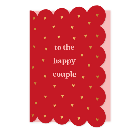 To the happy couple - Formaat: Normaal - Vorm: Staand - Huwelijkskaart - Op deze wenskaart staan gouden hartjes op een rode achtergrond met in het midden de tekst: "To the happy couple". - Snelwenskaart