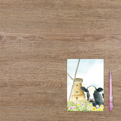 Koe met molen