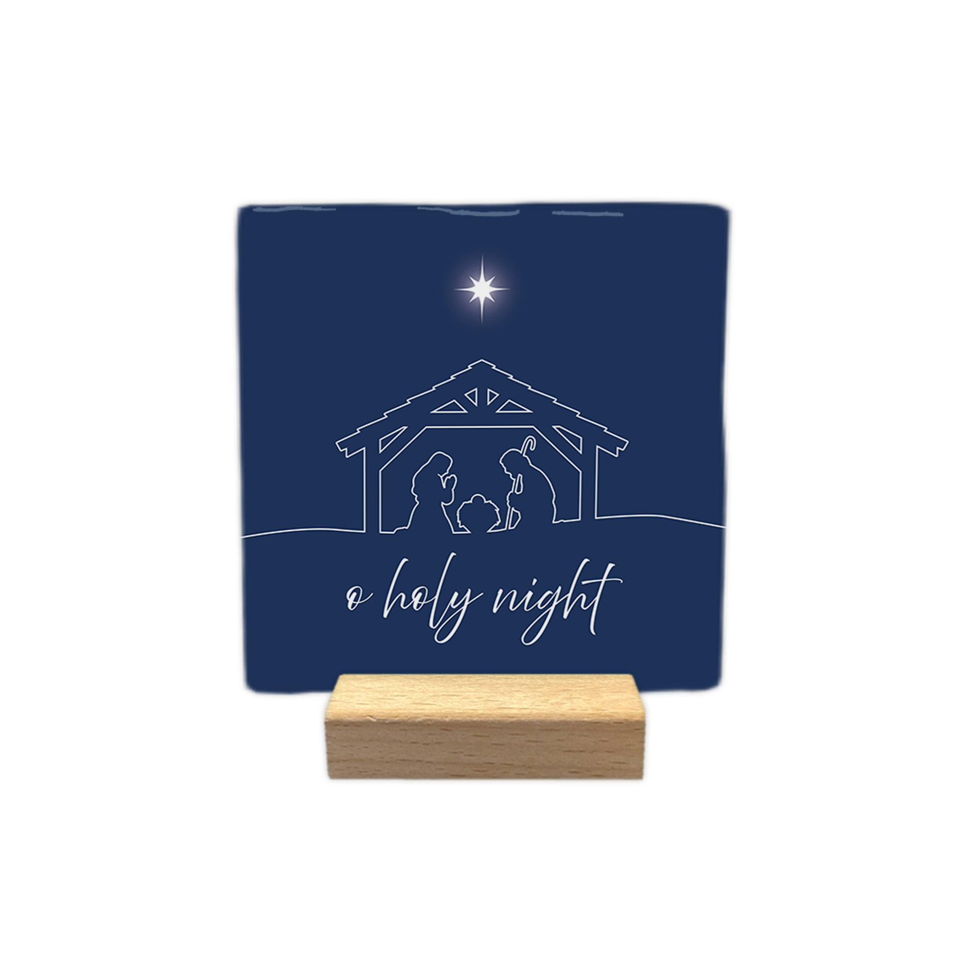 O holy night - Decoratie tegel - Formaat: - Op deze decoratie tegel staat een donkerblauwe achtergrond. In het midden is met witte lijnen een kerststal afgebeeld, met daarin de silhouetten van Maria, Jozef en het kindje Jezus in een kribbe. Boven de stal schittert een witte ster. Onderaan staat in witte sierletters de tekst o holy night. - Snelwenskaart