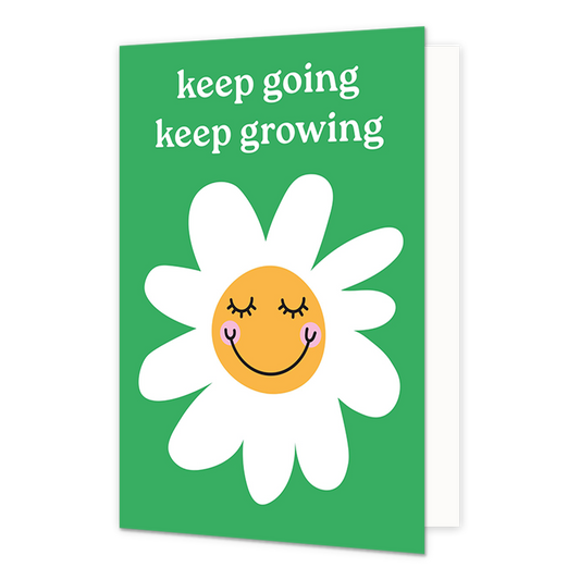 Op deze wenskaart staat een bloem met daarboven de tekst: "Keep going keep growing". 