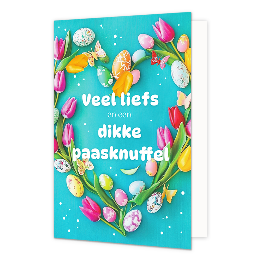 Veel liefs en een dikke paasknuffel - Formaat: Normaal - Vorm: Staand - Paaskaart - Op deze paaskaart staat een hartje gemaakt van bloemen en eitjes met in het midden de tekst: "Veel liefs en een dikke paasknuffel". - Snelwenskaart
