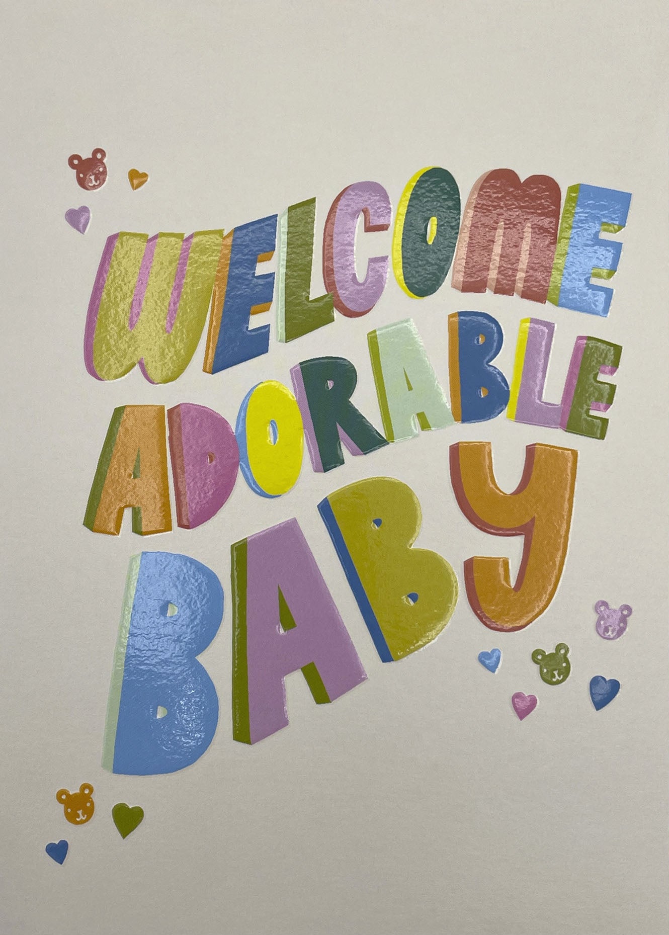 Op deze wenskaart staat de tekst: "Welcome adorable baby".