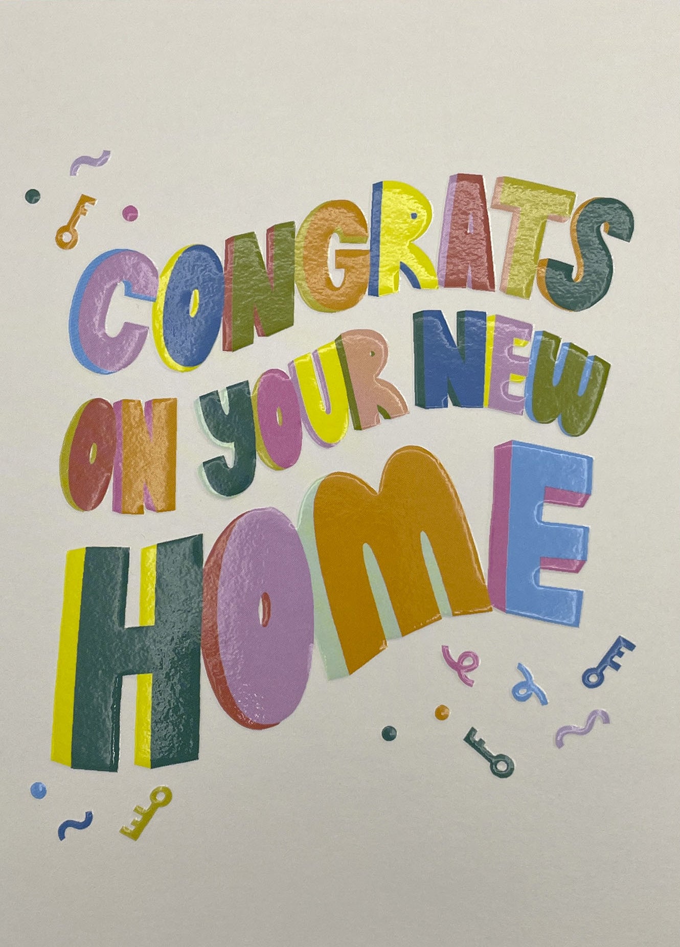 Op deze wenskaart staat de tekst: "Congrats on your new home".
