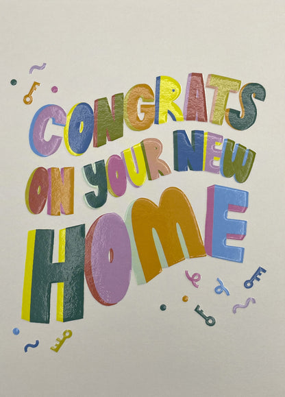 Op deze wenskaart staat de tekst: "Congrats on your new home".